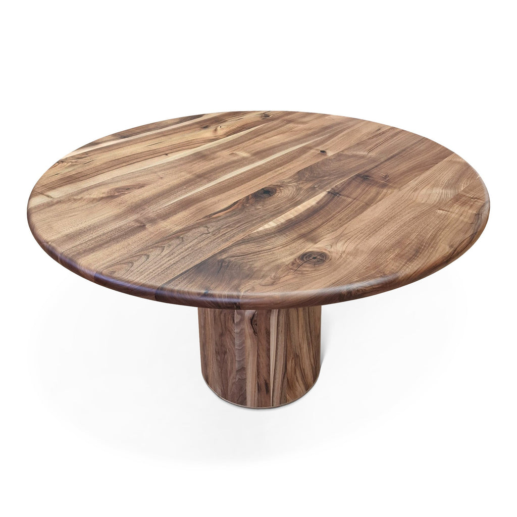 Table à Manger Ronde Extensible en Noyer - Cette luxueuse table à manger ronde – fabriquée à la main avec expertise à partir de noyer massif européen de première qualité – incarne