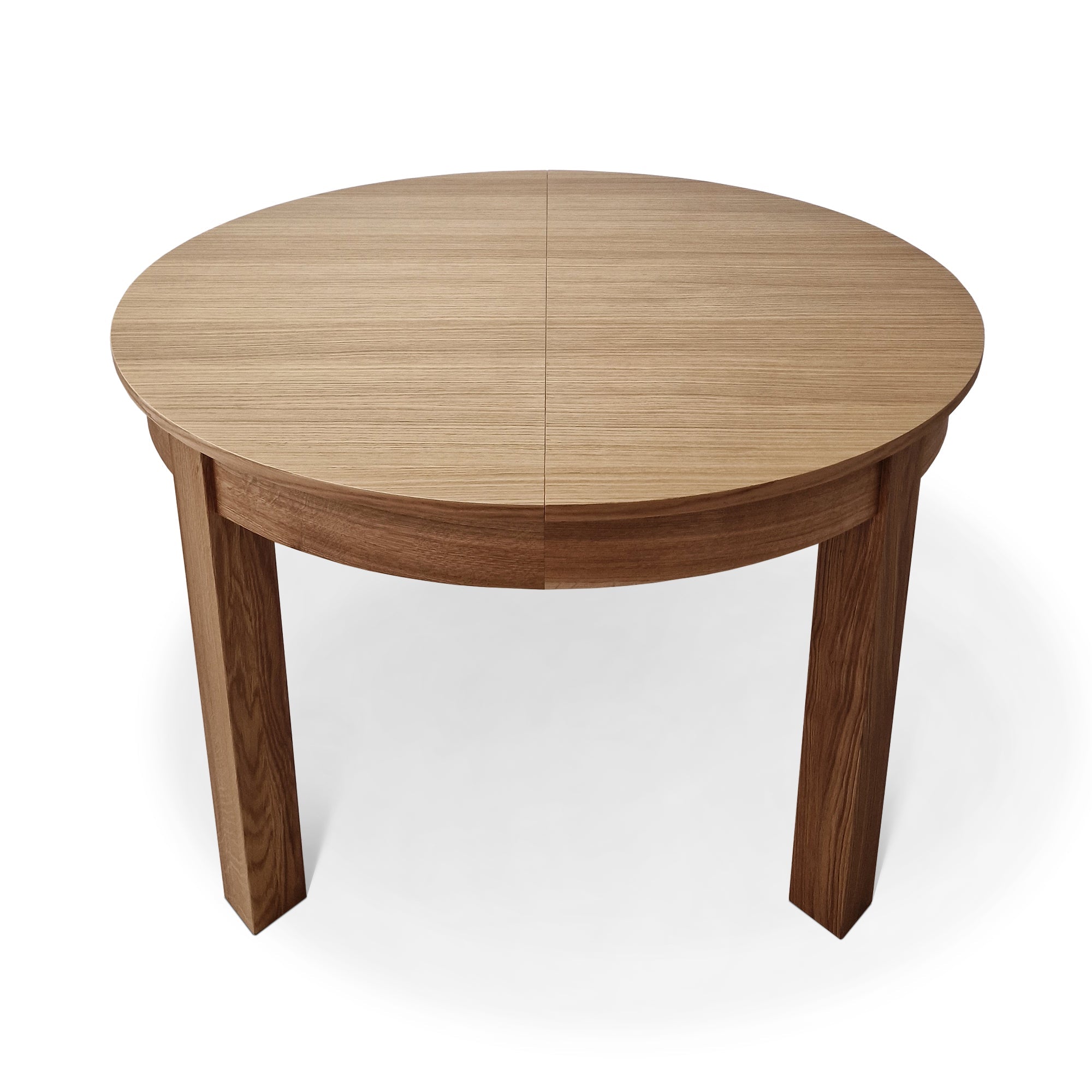 Table à rallonge avec rallonge intégrée - La table - fabriquée en chêne massif ou en placage - incarne le charme classique et la durabilité - Sa forme ronde