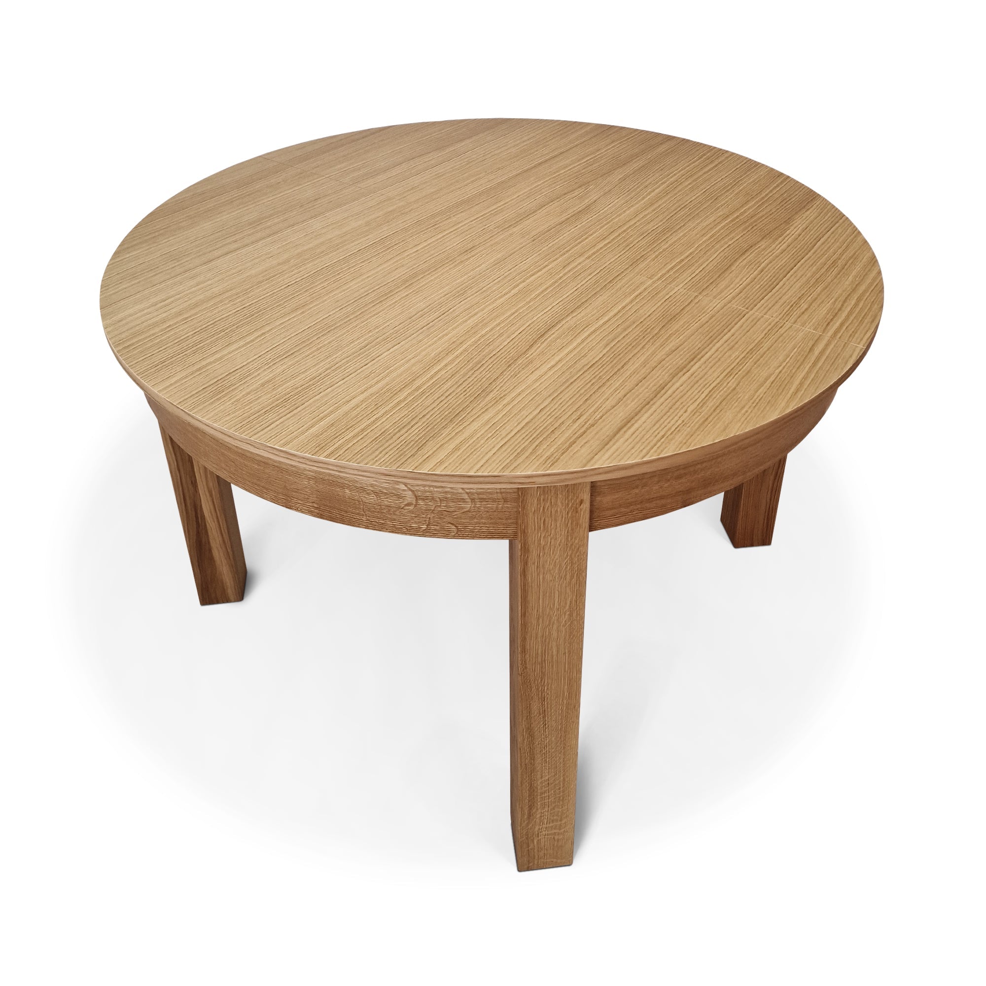 Table à rallonge avec rallonge intégrée - La table - fabriquée en chêne massif ou en placage - incarne le charme classique et la durabilité - Sa forme ronde