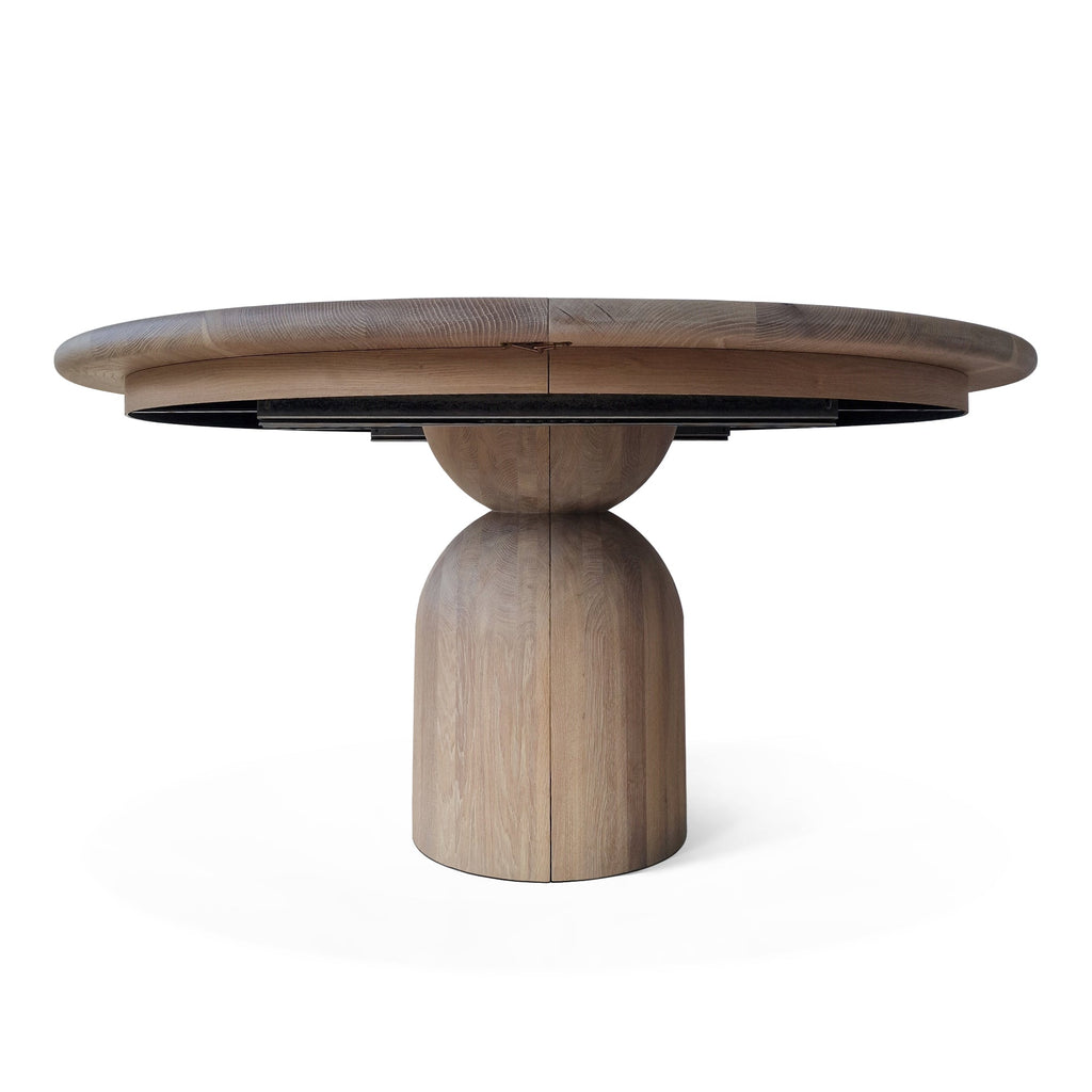 Table à manger ronde extensible en chêne - Plongez dans le mélange harmonieux de chaleur et de modernité avec notre table à manger ronde en chêne - rehaussée par des pieds ronds