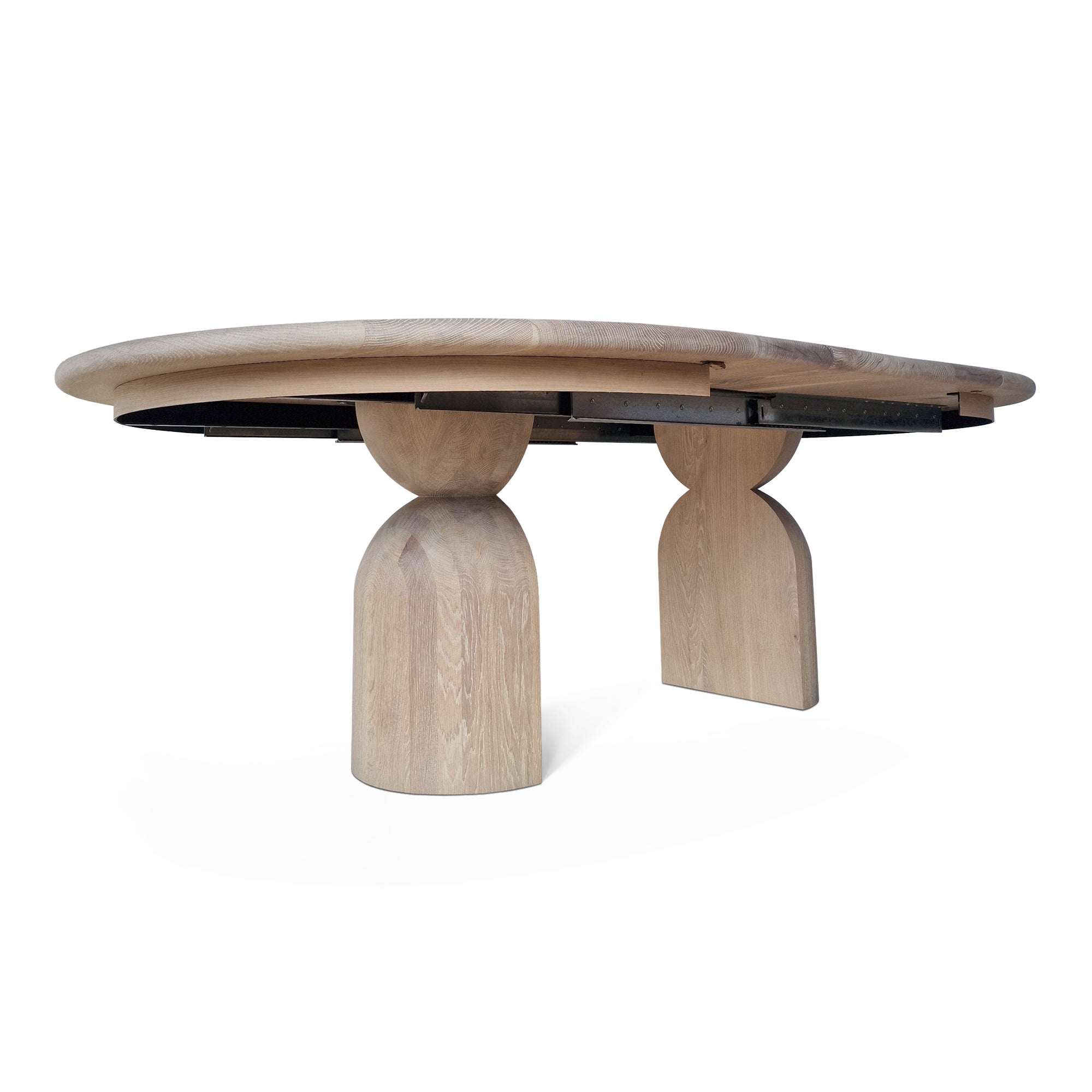 Table à manger ronde extensible en chêne - Plongez dans le mélange harmonieux de chaleur et de modernité avec notre table à manger ronde en chêne - rehaussée par des pieds ronds