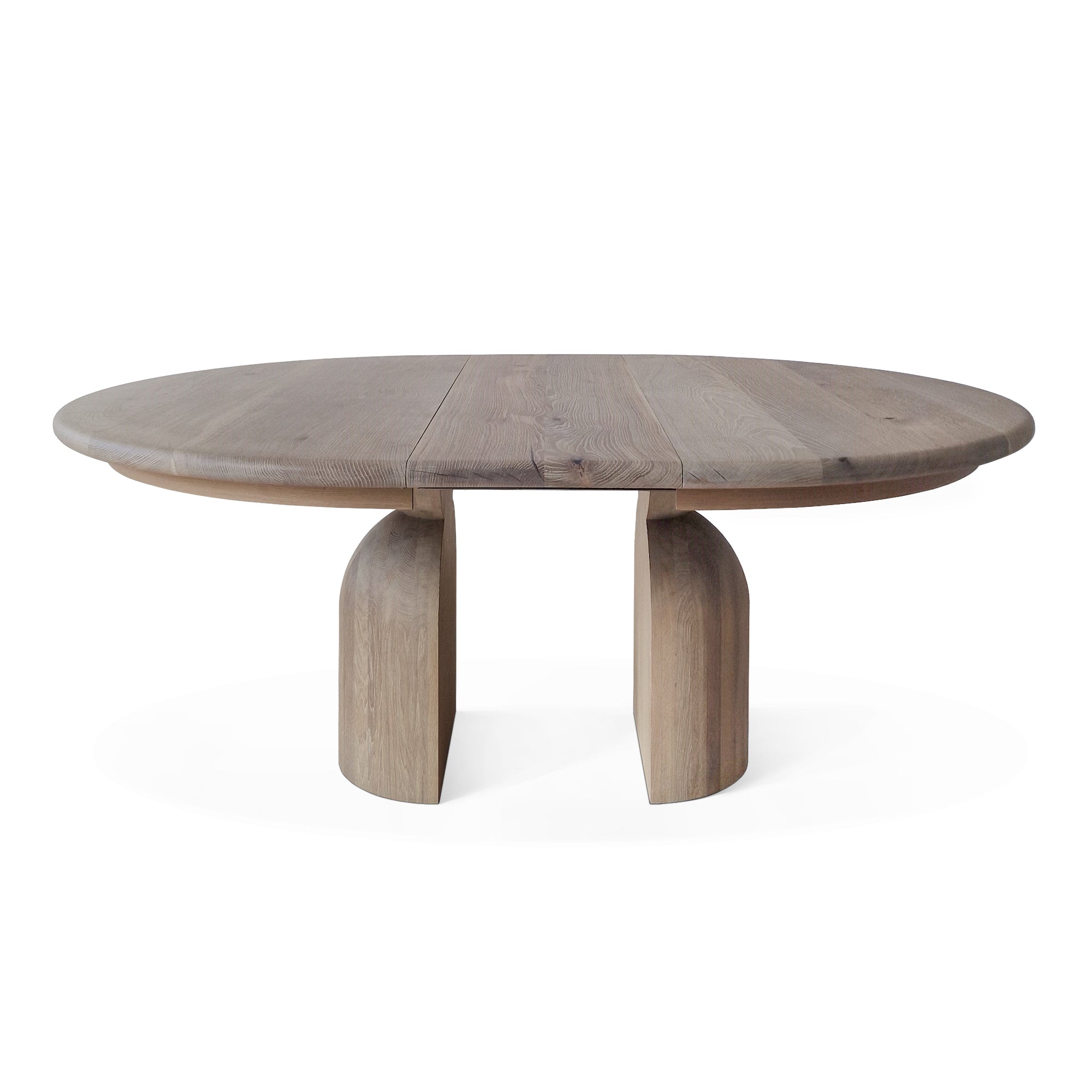Table à manger ronde extensible en chêne - Plongez dans le mélange harmonieux de chaleur et de modernité avec notre table à manger ronde en chêne - rehaussée par des pieds ronds