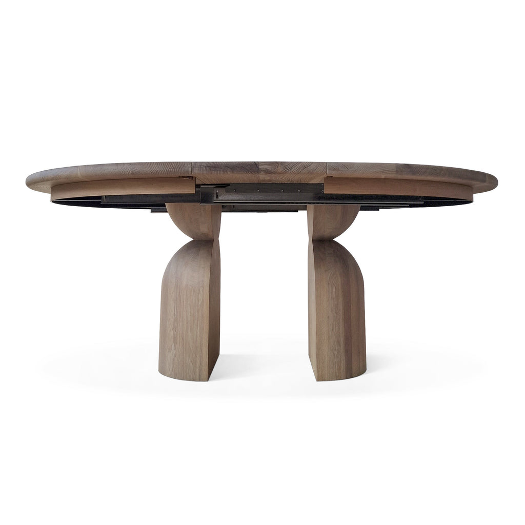Table à manger ronde extensible en chêne - Plongez dans le mélange harmonieux de chaleur et de modernité avec notre table à manger ronde en chêne - rehaussée par des pieds ronds