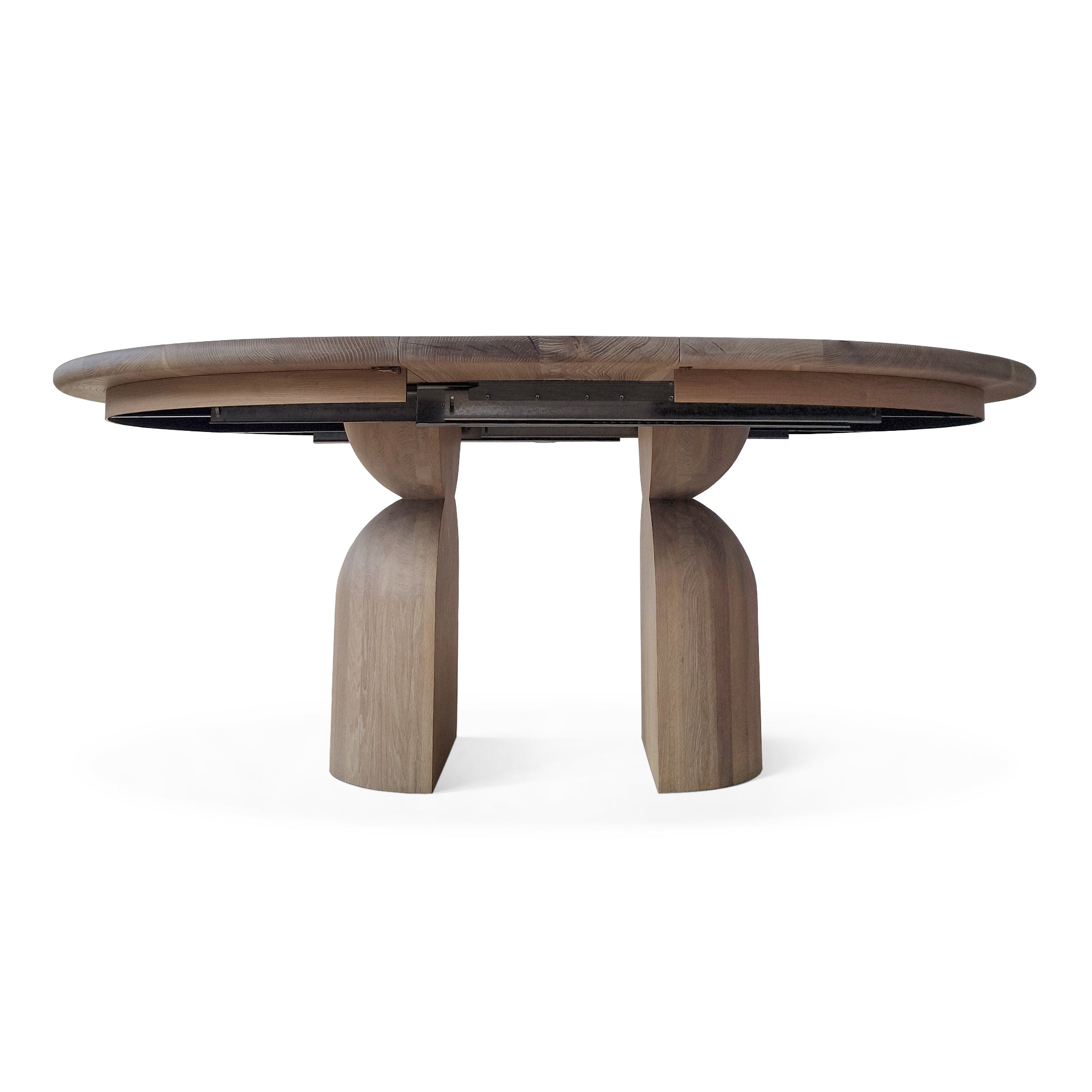 Table à manger ronde extensible en chêne - Plongez dans le mélange harmonieux de chaleur et de modernité avec notre table à manger ronde en chêne - rehaussée par des pieds ronds