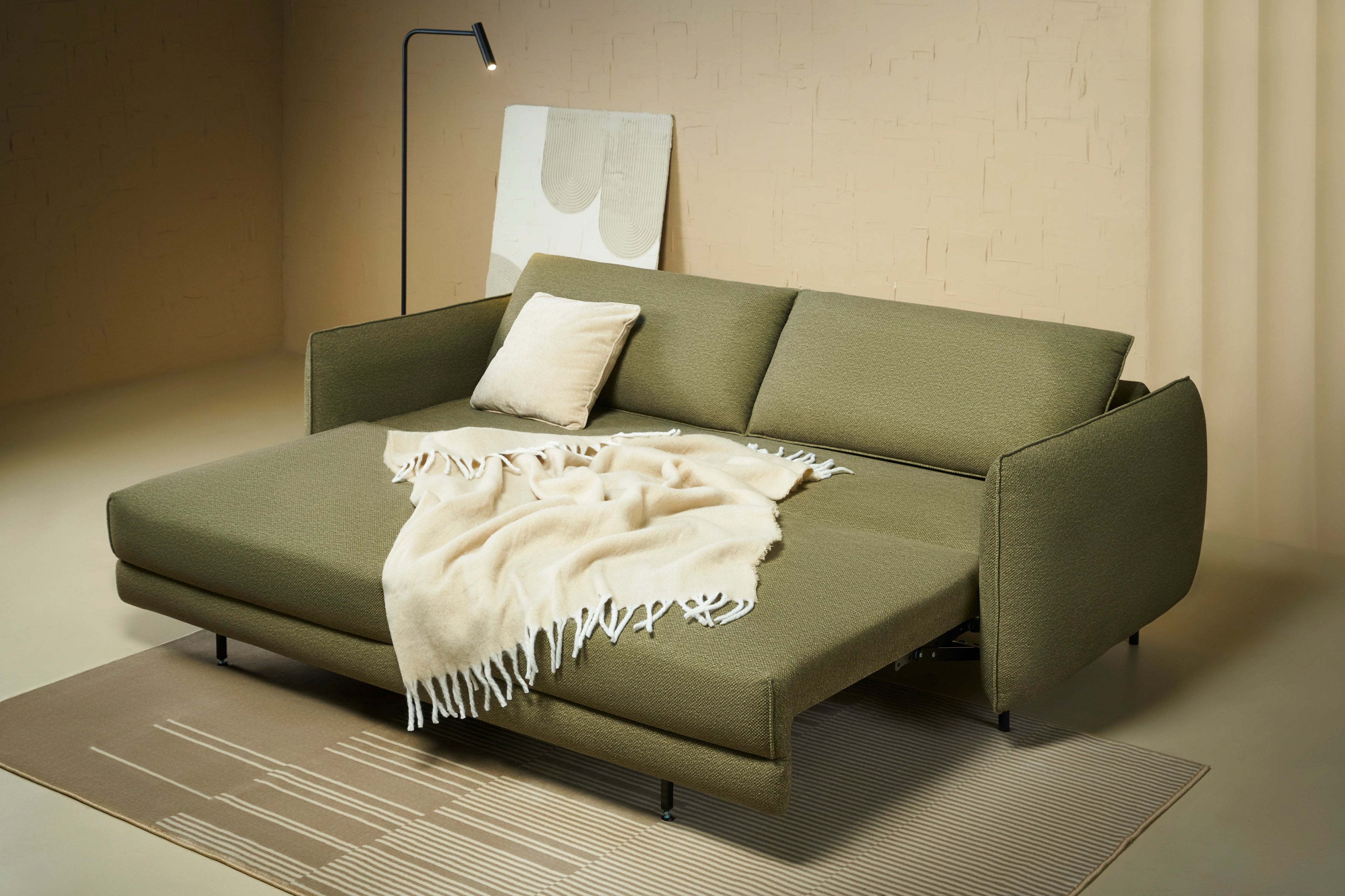 Canapé convertible - Découvrez le canapé convertible - un mélange parfait d'esthétique contemporaine et de luxe fonctionnel - Conçu pour s'intégrer harmonieusement dans tout intérieur moderne