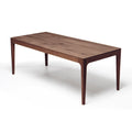 Table à Manger Extensible en Chêne Chocolat - La table à manger extensible en chêne chocolat se distingue par son design épuré et contemporain, caractérisé par son plateau lisse