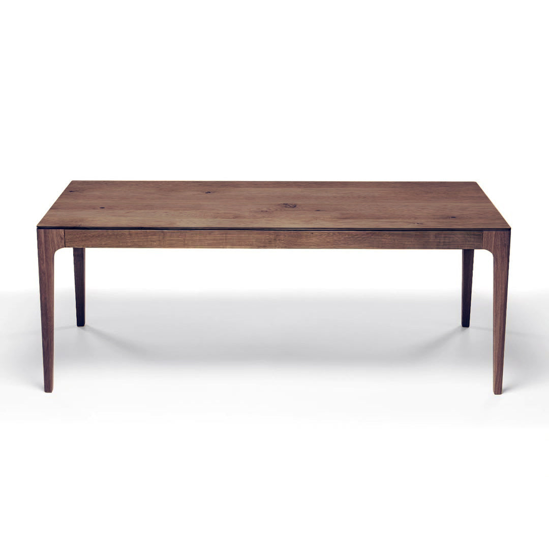 Table à Manger Extensible en Chêne Chocolat - La table à manger extensible en chêne chocolat se distingue par son design épuré et contemporain, caractérisé par son plateau lisse
