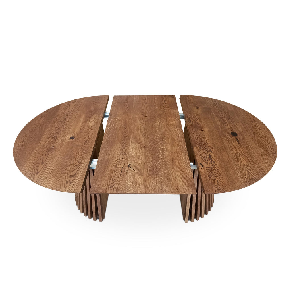 Table à manger ronde extensible en chêne chocolat - Découvrez notre table à manger ronde extensible fabriquée à la main en chêne chocolat avec pieds en tube - une