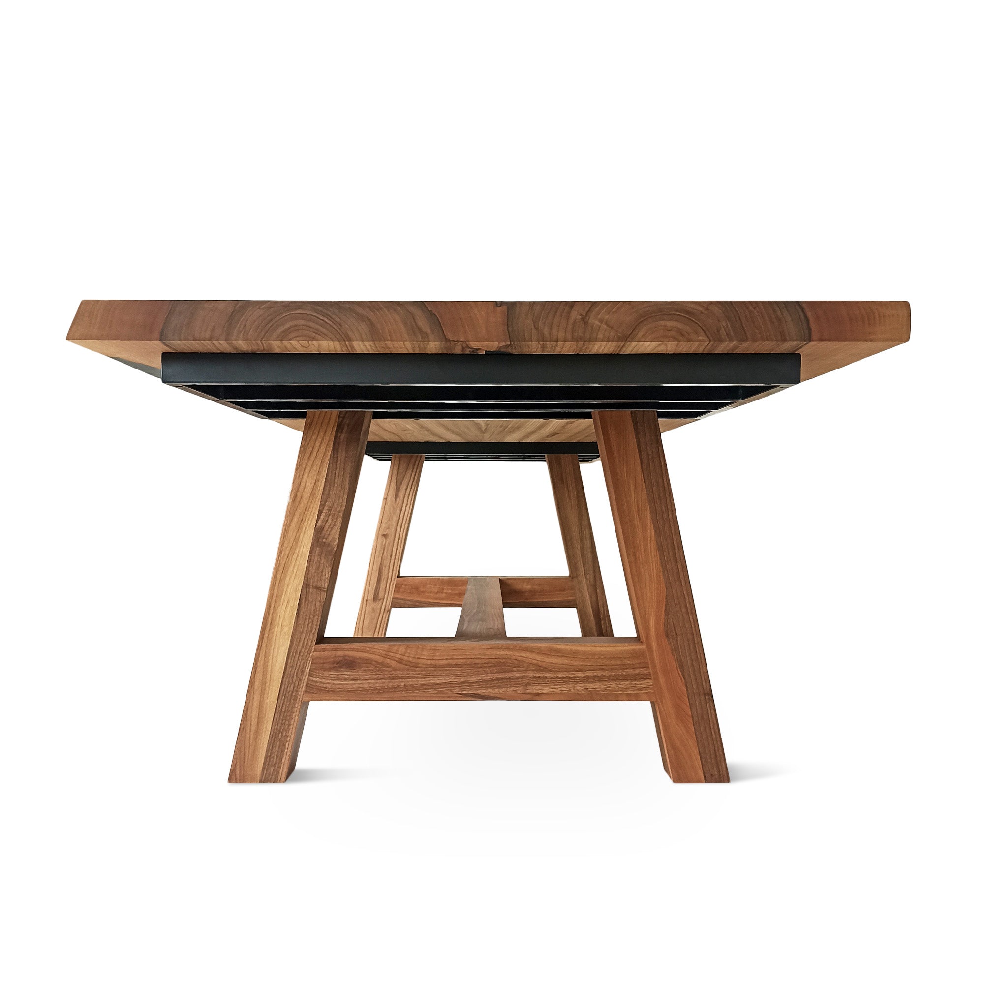 Table à manger extensible en noyer – Découvrez la table à manger en noyer massif – une pièce qui allie harmonieusement le charme serein de la vie rurale à