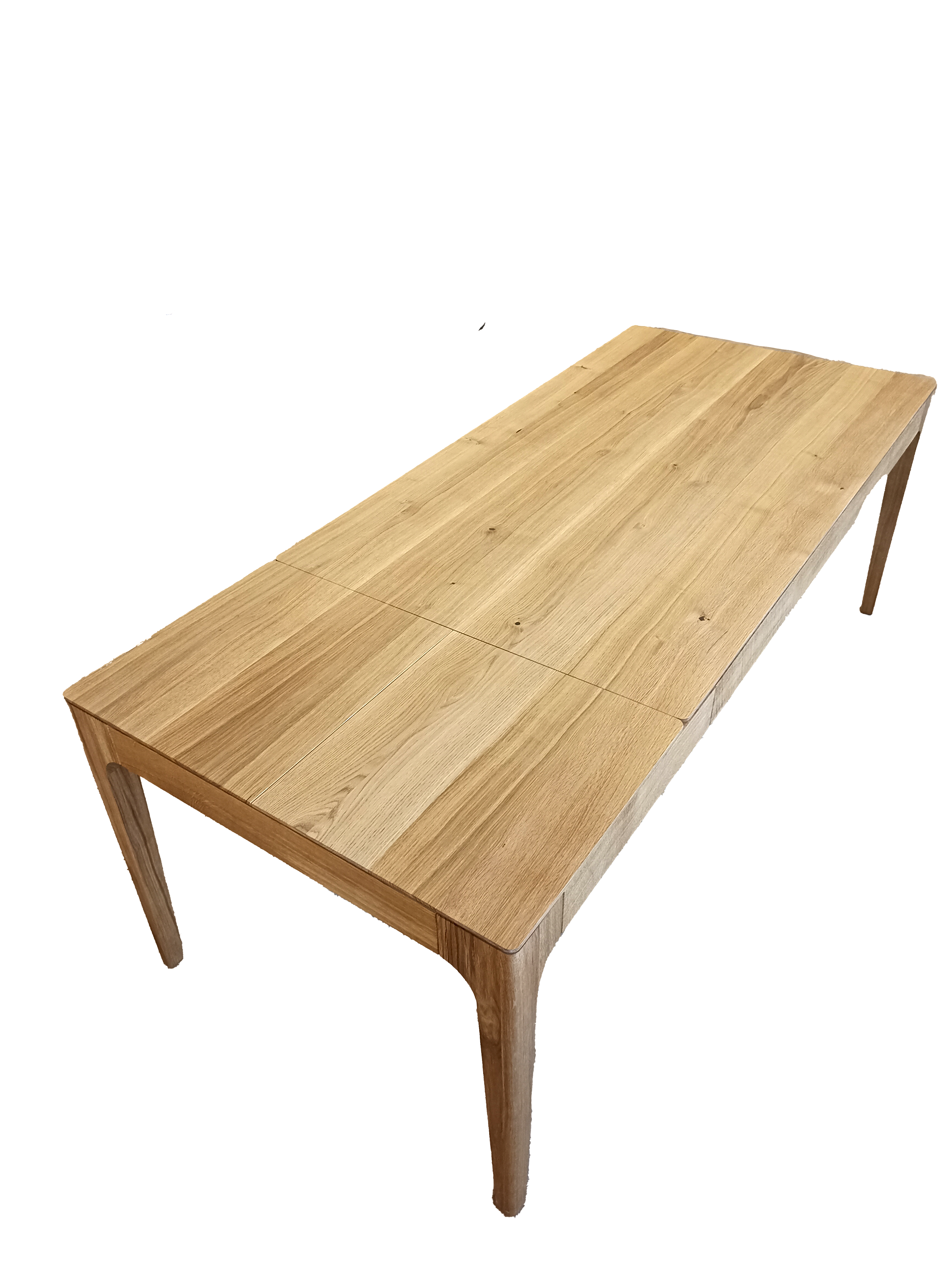 Table à manger extensible en chêne – La table de salle à manger en chêne affiche un design élégant et contemporain, caractérisé par ses lignes fluides et son épaisseur fuselée