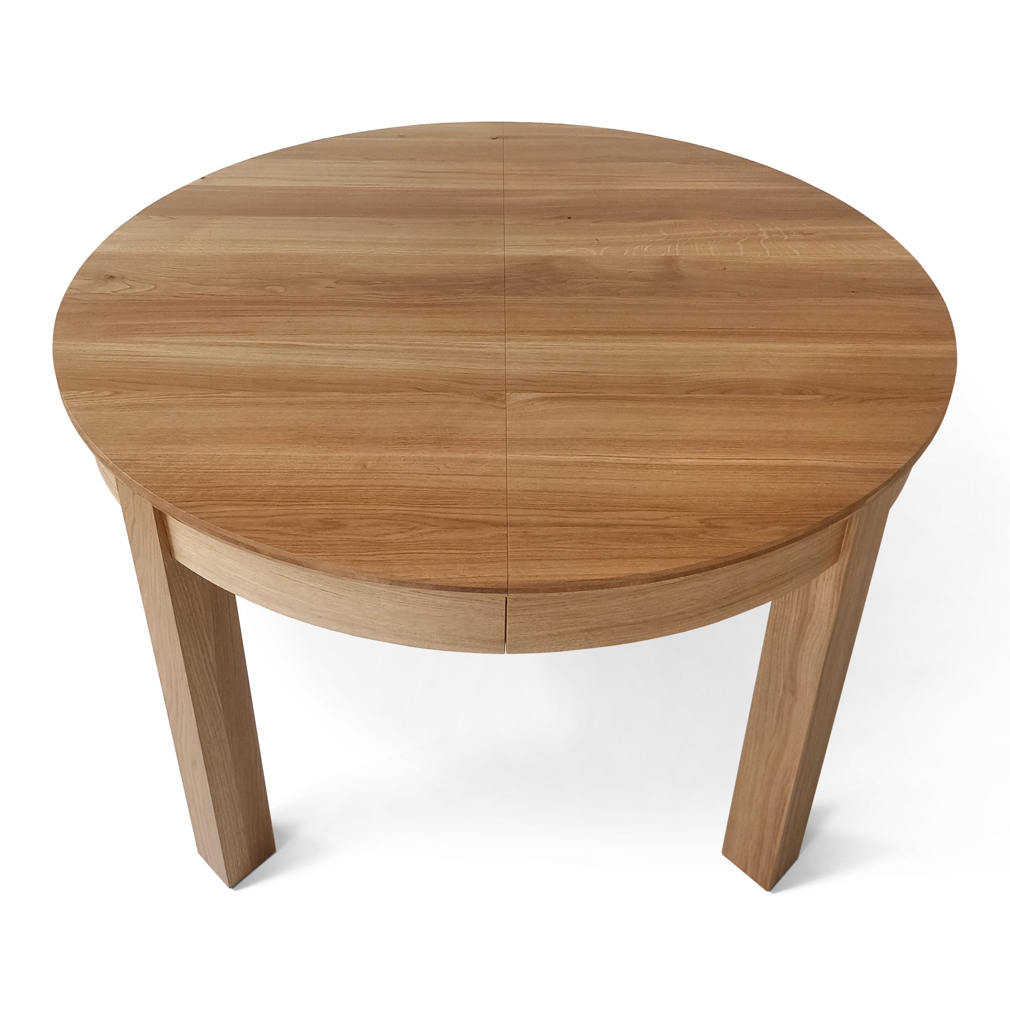 Table à rallonge avec rallonge intégrée - La table - fabriquée en chêne massif ou en placage - incarne le charme classique et la durabilité - Sa forme ronde