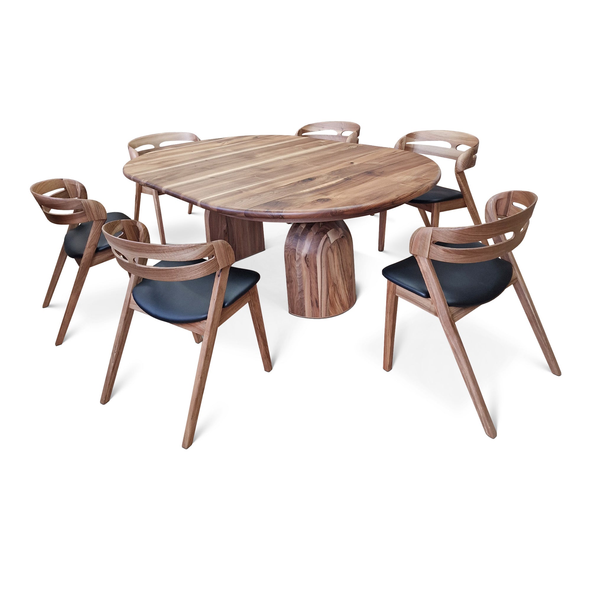 Table à Manger Ronde Extensible en Noyer - Cette luxueuse table à manger ronde – fabriquée à la main avec expertise à partir de noyer massif européen de première qualité – incarne
