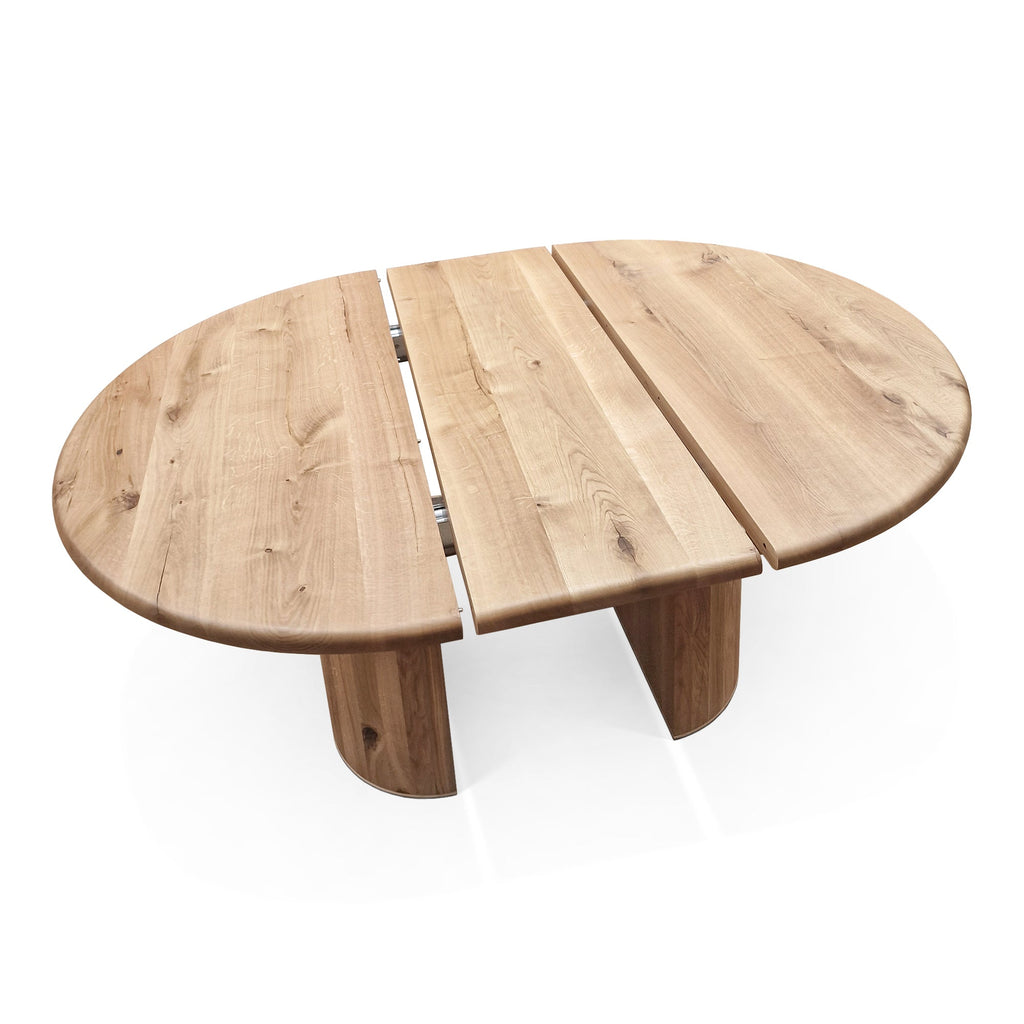Table à manger ronde extensible en chêne - Plongez dans le mélange harmonieux de chaleur et de modernité avec notre table à manger ronde en chêne - rehaussée par des pieds ronds
