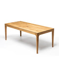 Table à manger extensible en chêne – La table de salle à manger en chêne affiche un design élégant et contemporain, caractérisé par ses lignes fluides et son épaisseur fuselée