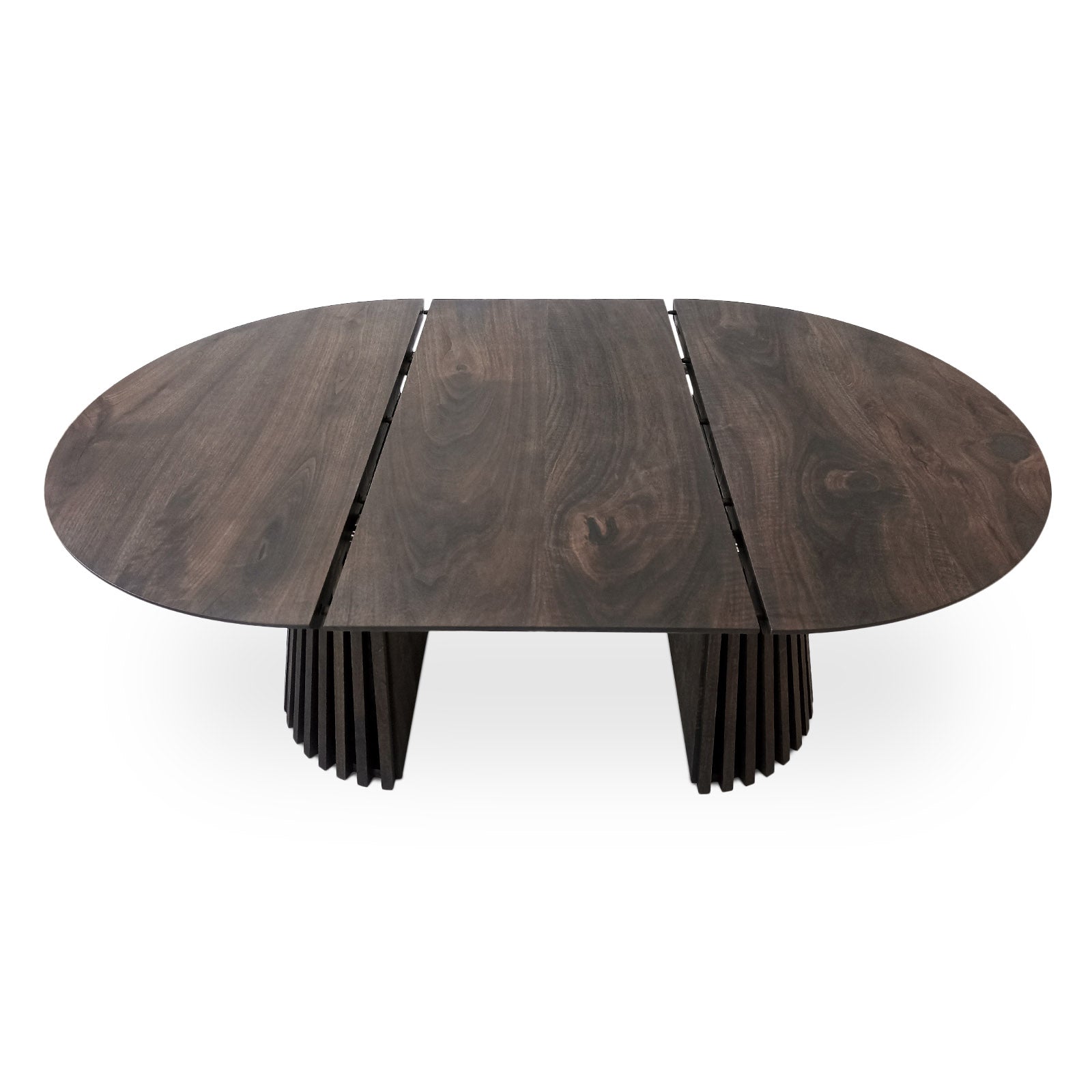 La table de salle à manger ronde extensible en noyer anthracite – avec son pied tubulaire distinctif à facettes – est un chef-d'œuvre unique et sur mesure qui fusionne